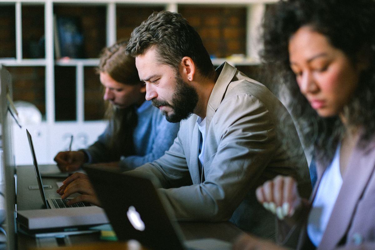 Coworkers working together at a desk